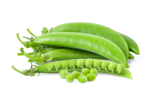 Green Peas Are In A White Container On A White Surface With A Lid To