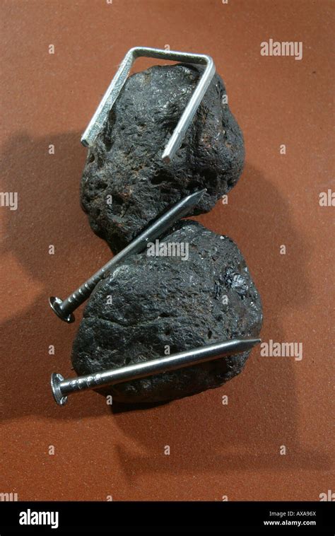 Magnetite Stone Magnetic Action Holds Metal Items Against Itself Stock